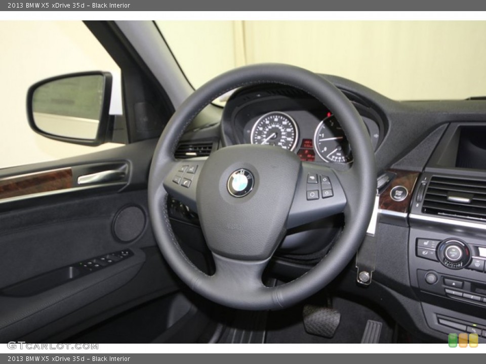 Black Interior Steering Wheel for the 2013 BMW X5 xDrive 35d #75909857