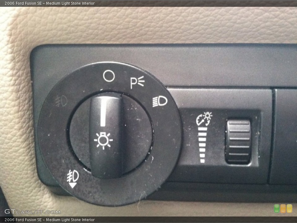 Medium Light Stone Interior Controls for the 2006 Ford Fusion SE #75936125