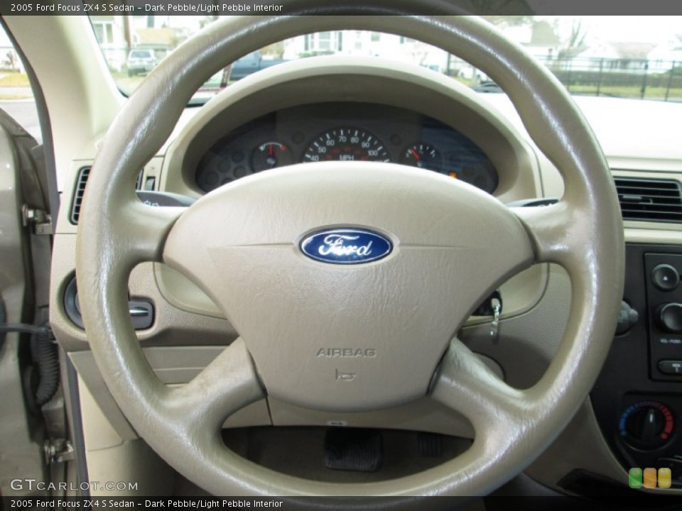 Dark Pebble/Light Pebble Interior Steering Wheel for the 2005 Ford Focus ZX4 S Sedan #75958201