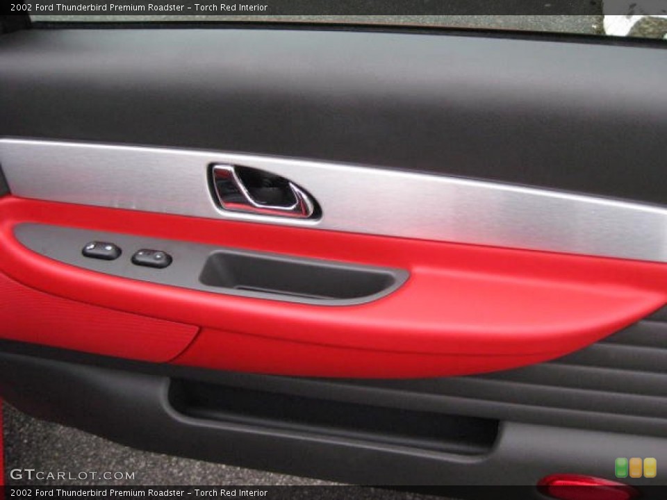 Torch Red Interior Door Panel for the 2002 Ford Thunderbird Premium Roadster #75991957