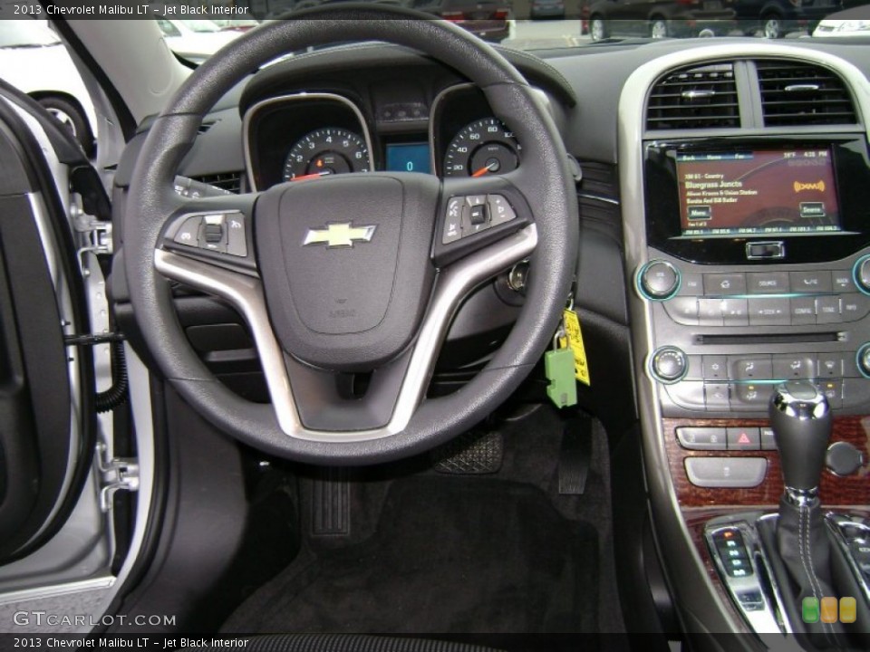 Jet Black Interior Steering Wheel for the 2013 Chevrolet Malibu LT #75994515