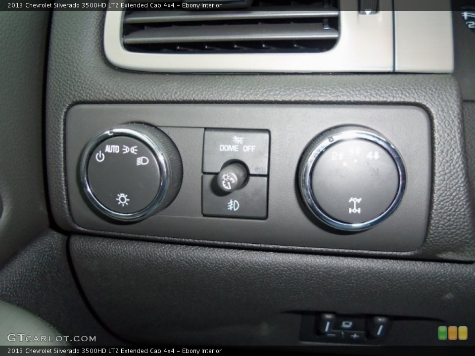 Ebony Interior Controls for the 2013 Chevrolet Silverado 3500HD LTZ Extended Cab 4x4 #76007823
