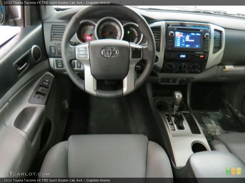 Graphite Interior Dashboard for the 2013 Toyota Tacoma V6 TRD Sport Double Cab 4x4 #76022665