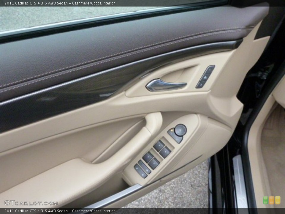 Cashmere/Cocoa Interior Door Panel for the 2011 Cadillac CTS 4 3.6 AWD Sedan #76038890