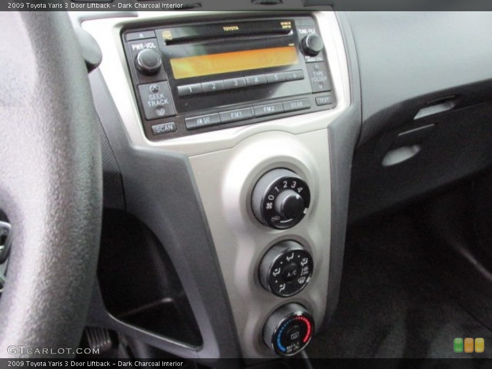 Dark Charcoal Interior Controls for the 2009 Toyota Yaris 3 Door Liftback #76041181