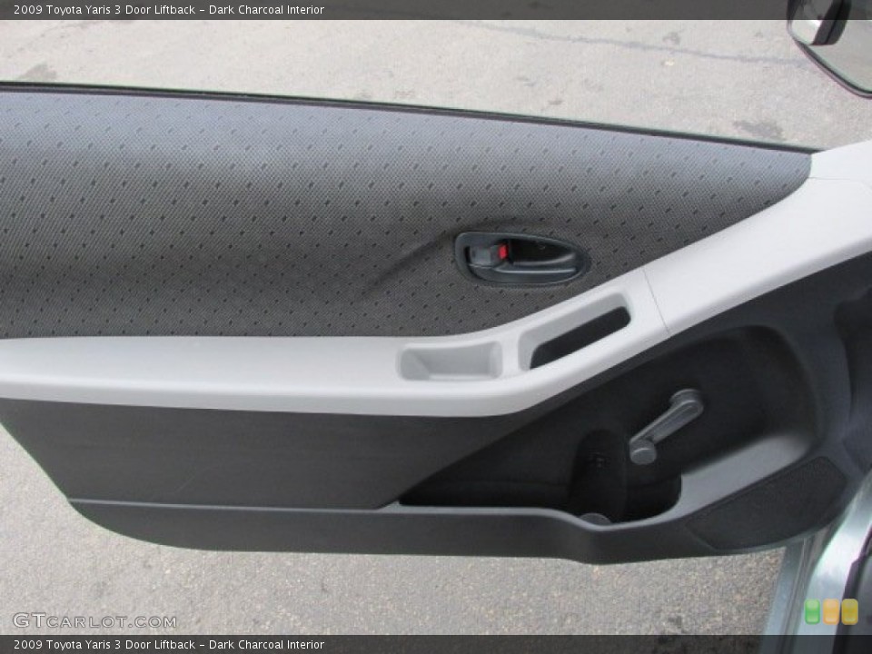 Dark Charcoal Interior Door Panel for the 2009 Toyota Yaris 3 Door Liftback #76041192