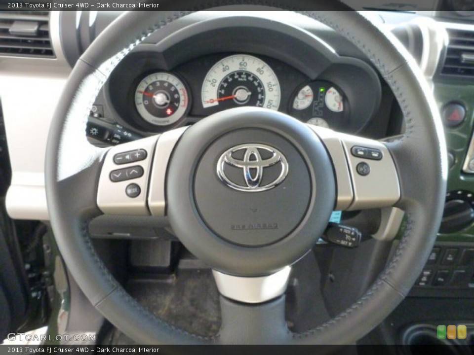 Dark Charcoal Interior Steering Wheel for the 2013 Toyota FJ Cruiser 4WD #76078488