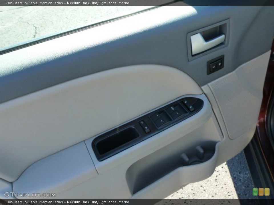 Medium Dark Flint/Light Stone Interior Door Panel for the 2009 Mercury Sable Premier Sedan #76082096