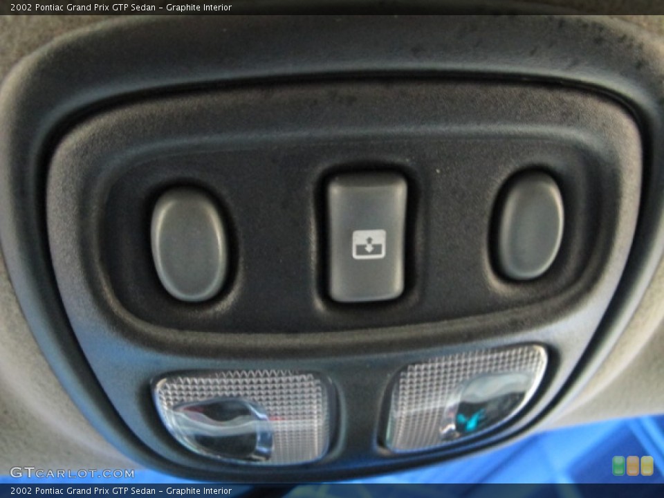Graphite Interior Controls for the 2002 Pontiac Grand Prix GTP Sedan #76144578