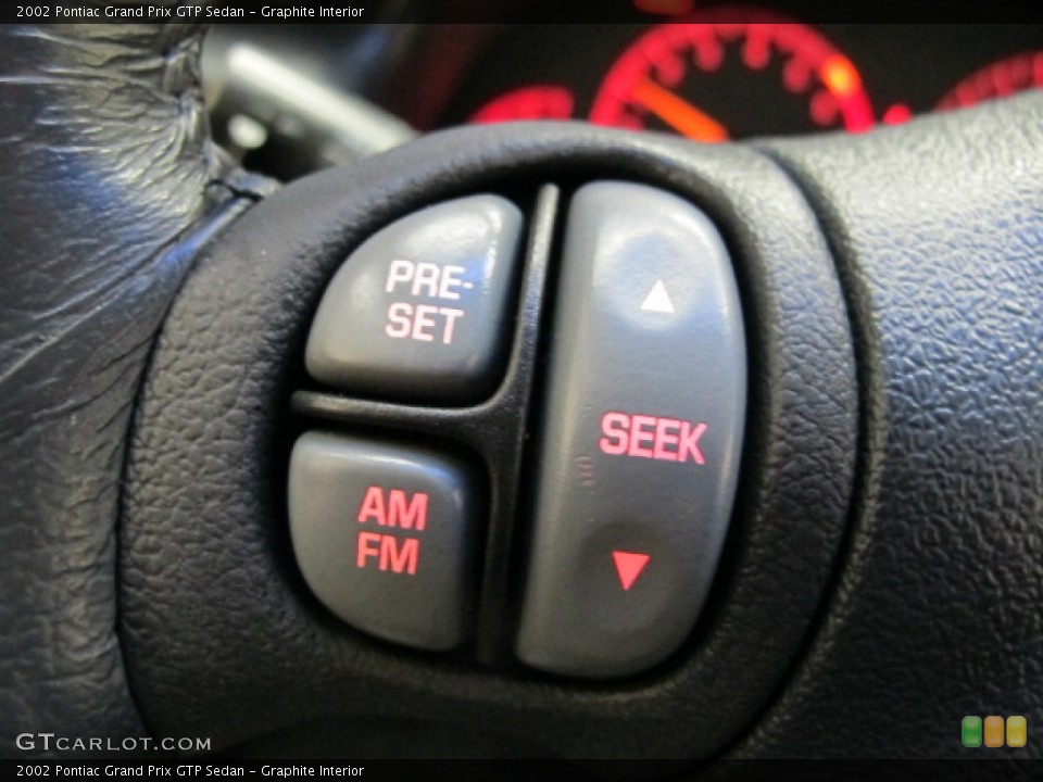 Graphite Interior Controls for the 2002 Pontiac Grand Prix GTP Sedan #76144635