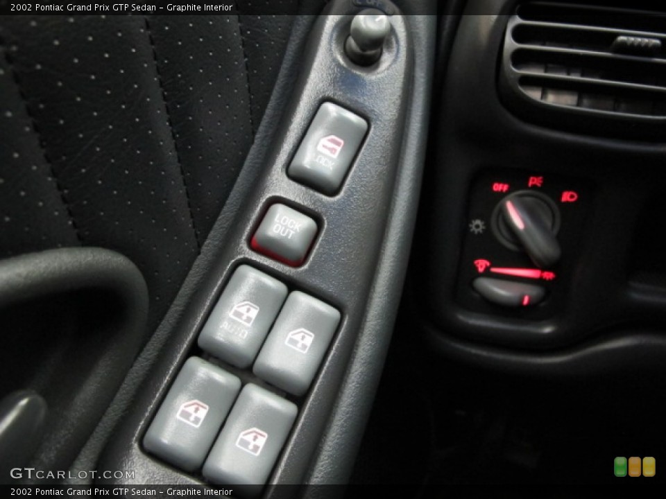 Graphite Interior Controls for the 2002 Pontiac Grand Prix GTP Sedan #76144672