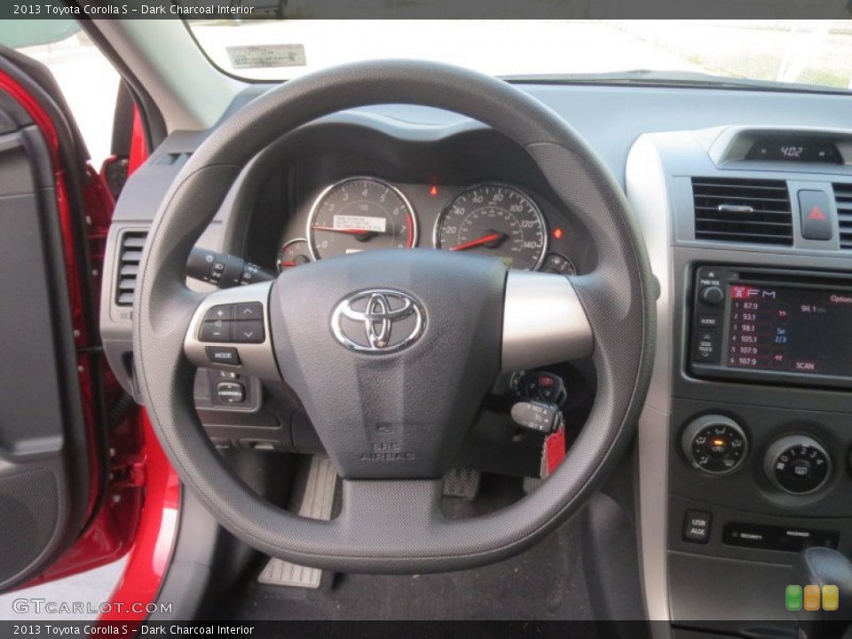 Dark Charcoal Interior Steering Wheel for the 2013 Toyota Corolla S #76194789