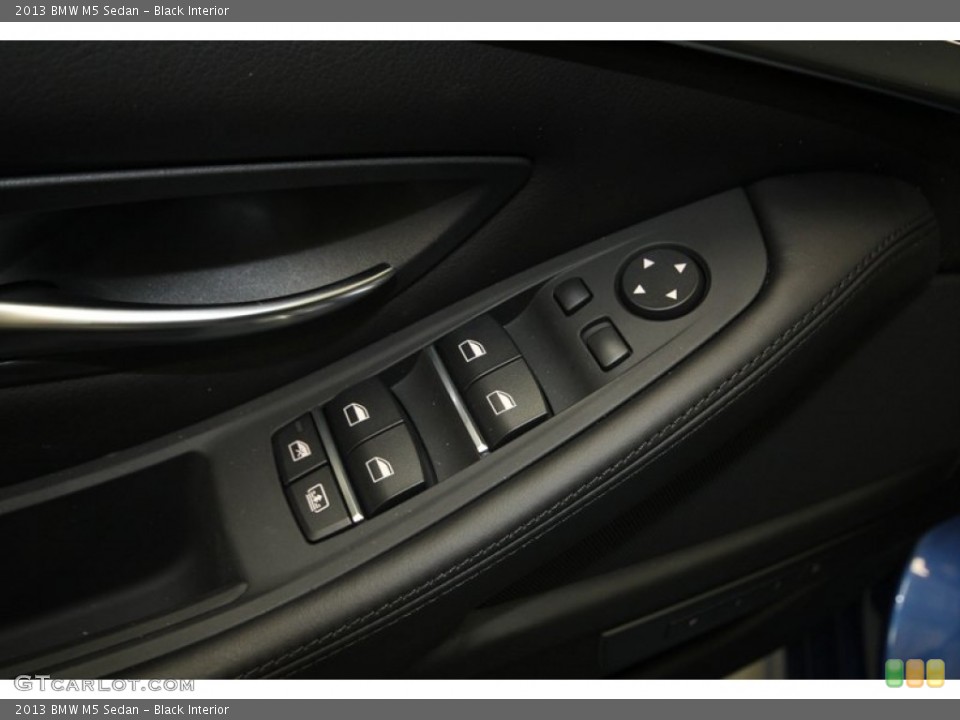 Black Interior Controls for the 2013 BMW M5 Sedan #76195389