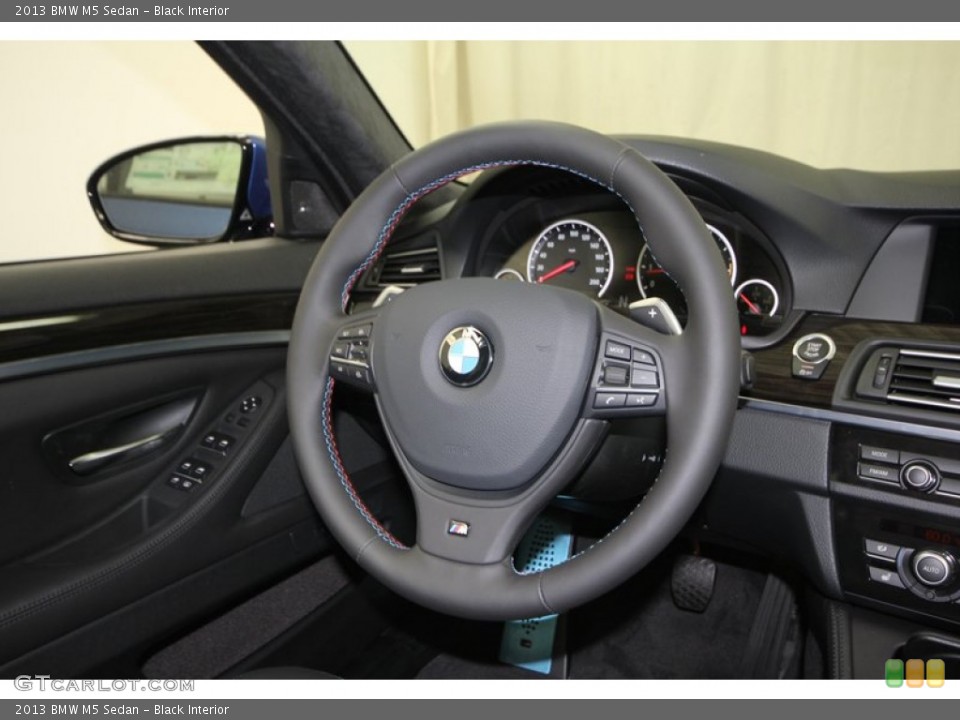 Black Interior Steering Wheel for the 2013 BMW M5 Sedan #76195610