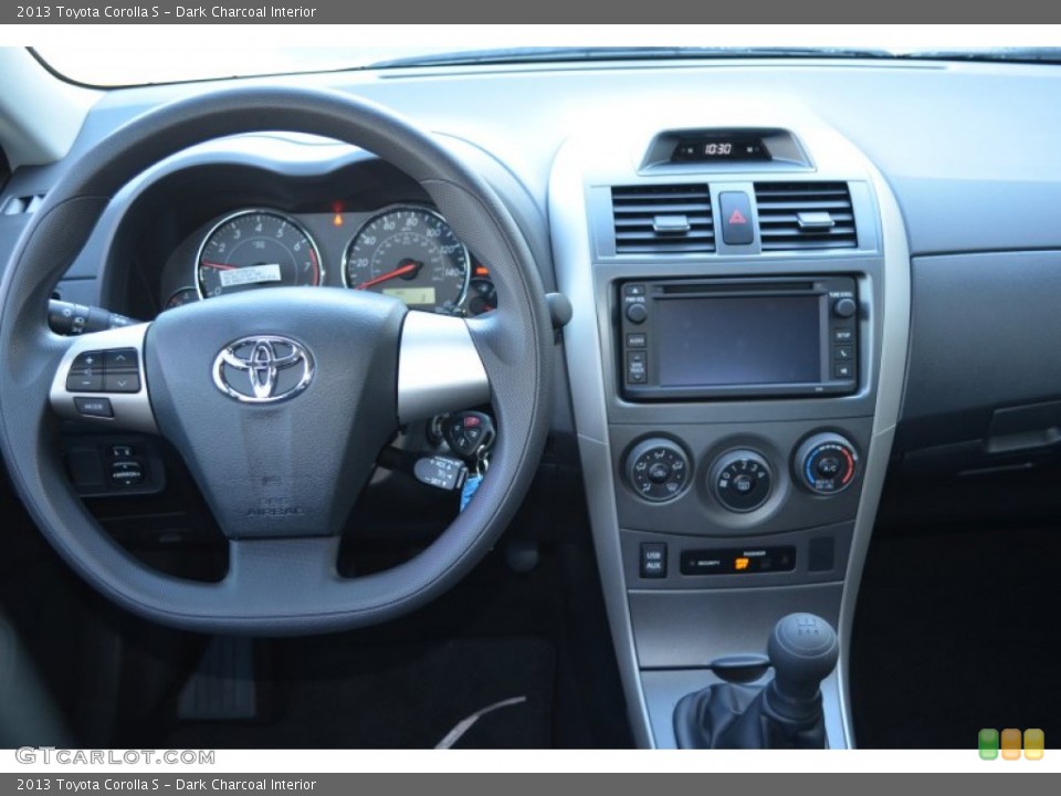 Dark Charcoal Interior Dashboard for the 2013 Toyota Corolla S #76220069