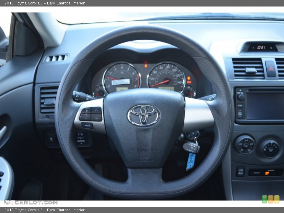 Dark Charcoal Interior Steering Wheel for the 2013 Toyota Corolla S #76220075