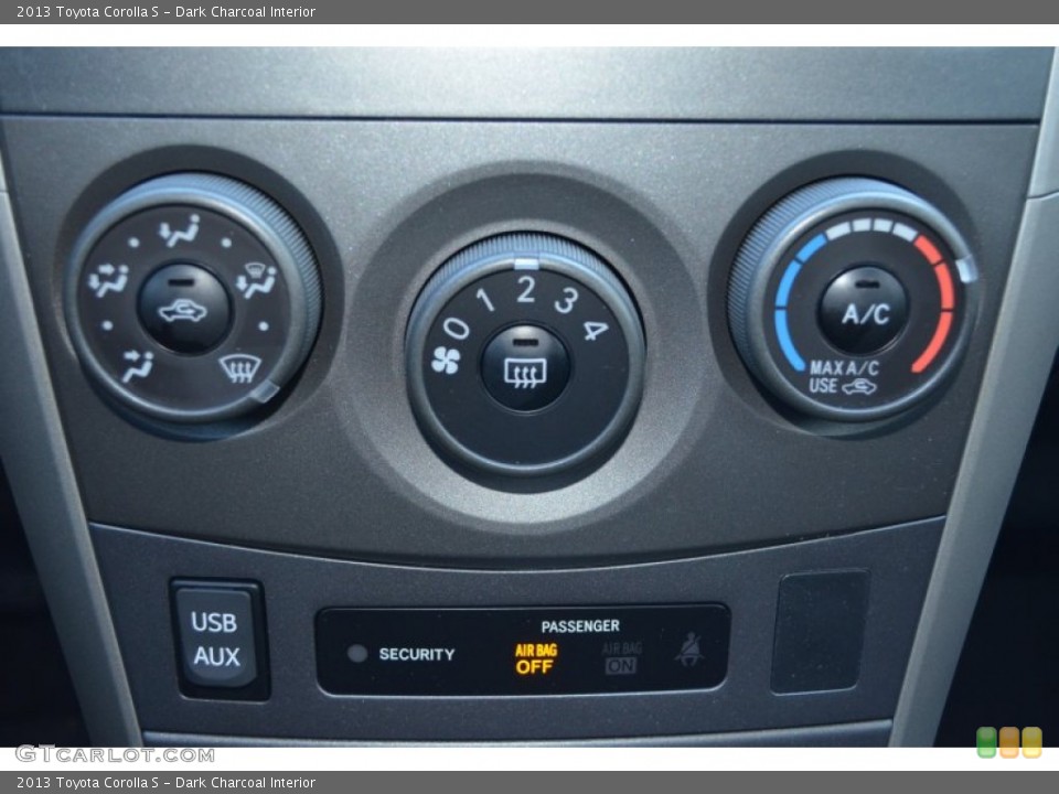 Dark Charcoal Interior Controls for the 2013 Toyota Corolla S #76220123