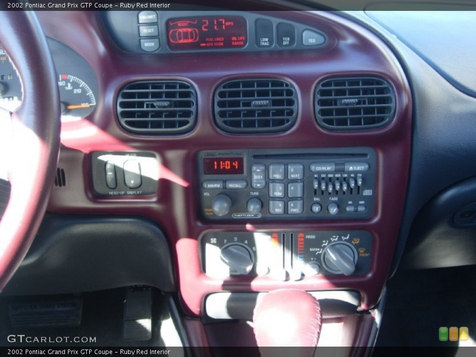 Ruby Red Interior Controls for the 2002 Pontiac Grand Prix GTP Coupe #76230458
