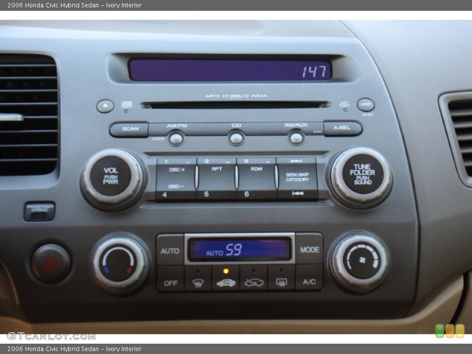 Ivory Interior Controls for the 2006 Honda Civic Hybrid Sedan #76234730