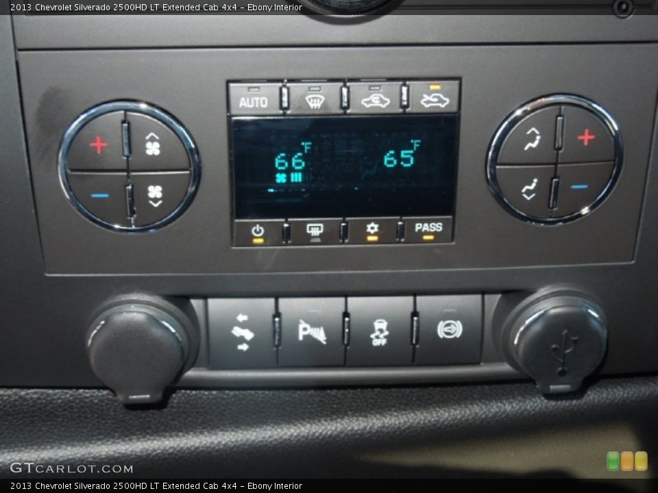 Ebony Interior Controls for the 2013 Chevrolet Silverado 2500HD LT Extended Cab 4x4 #76245464