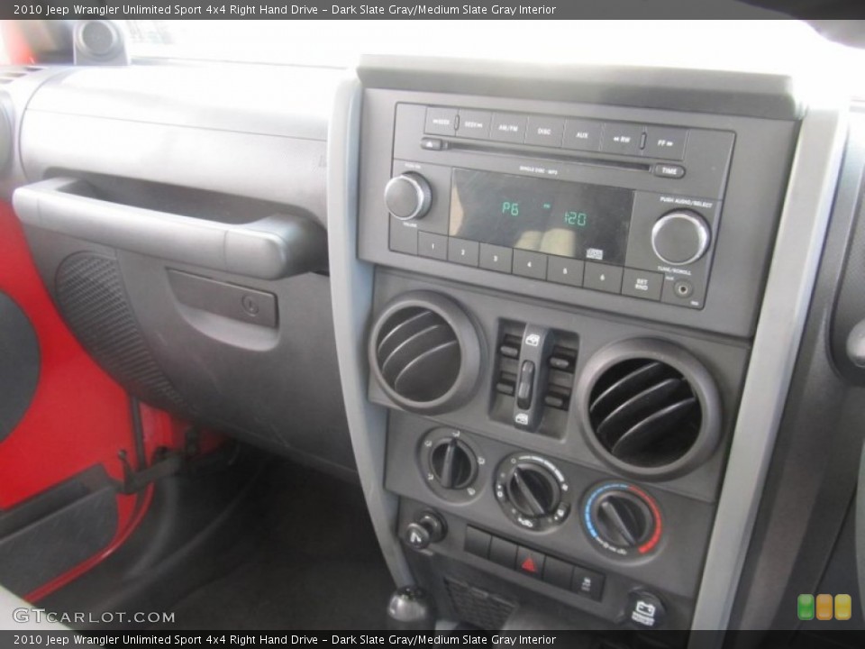 Dark Slate Gray/Medium Slate Gray Interior Controls for the 2010 Jeep Wrangler Unlimited Sport 4x4 Right Hand Drive #76247156