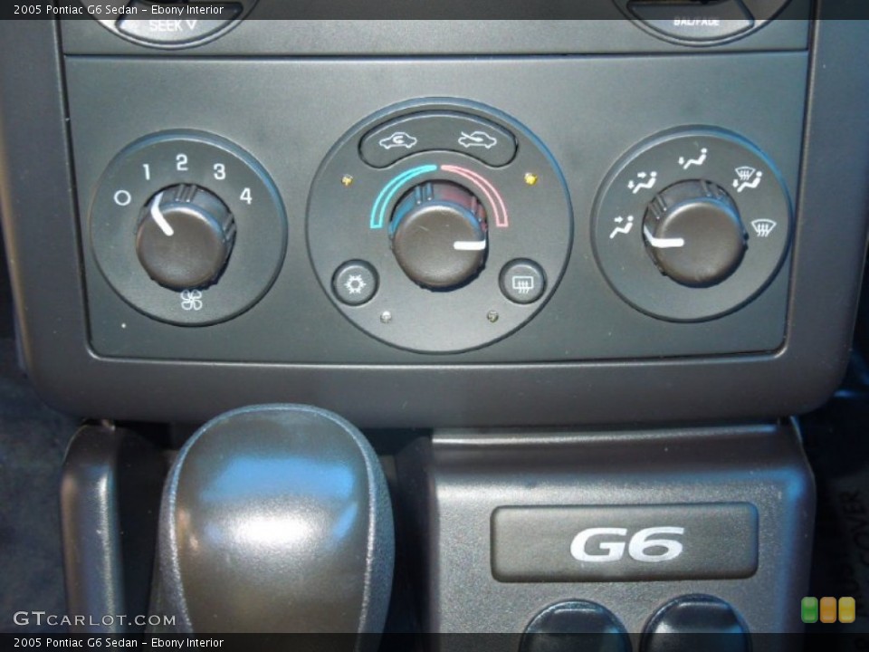 Ebony Interior Controls for the 2005 Pontiac G6 Sedan #76255228