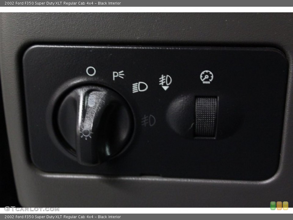 Black Interior Controls for the 2002 Ford F350 Super Duty XLT Regular Cab 4x4 #76256435