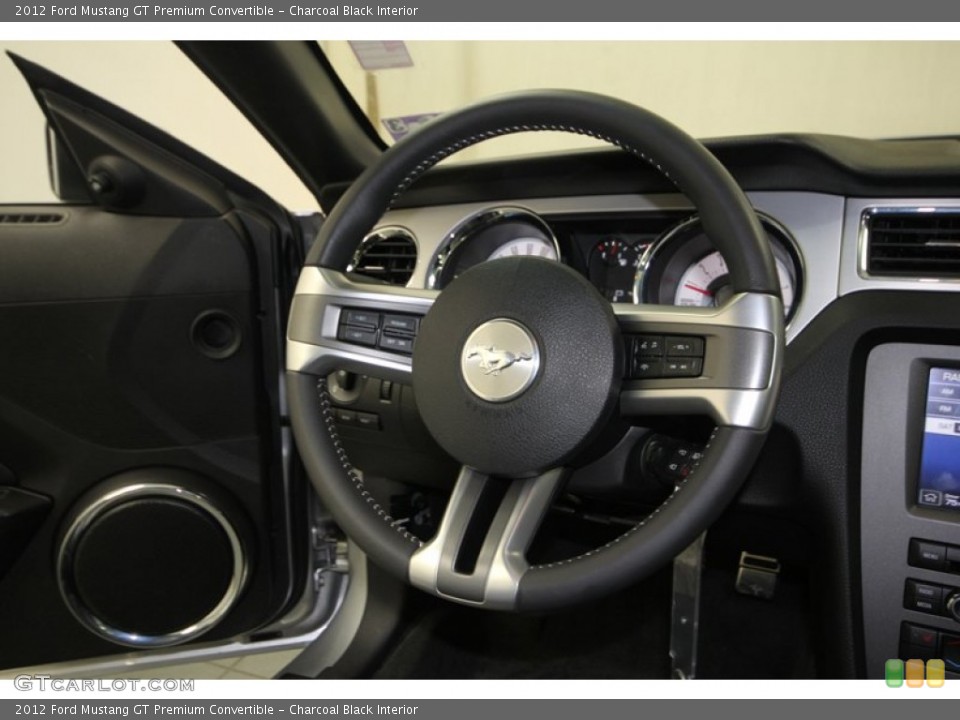 Charcoal Black Interior Steering Wheel for the 2012 Ford Mustang GT Premium Convertible #76264025
