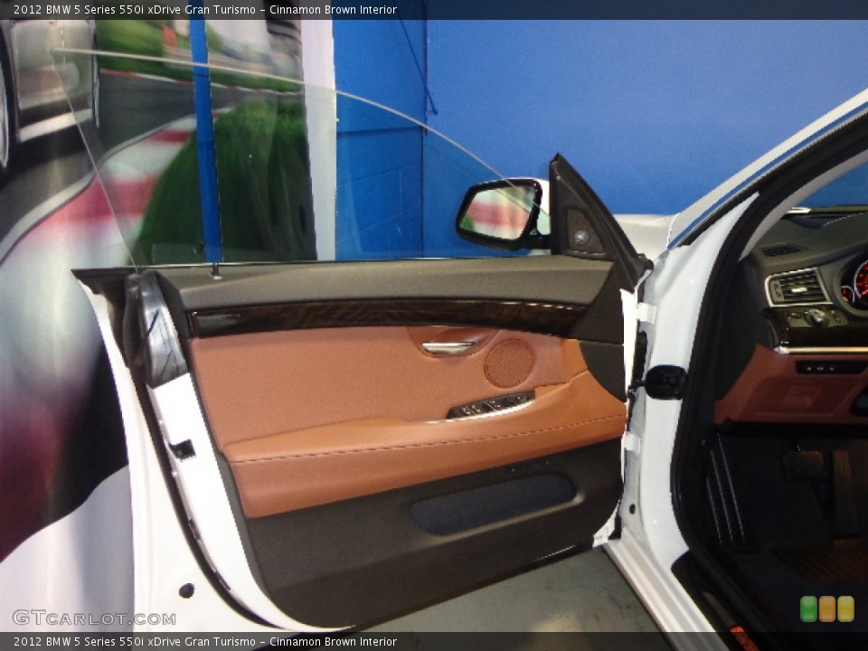 Cinnamon Brown Interior Door Panel for the 2012 BMW 5 Series 550i xDrive Gran Turismo #76268651