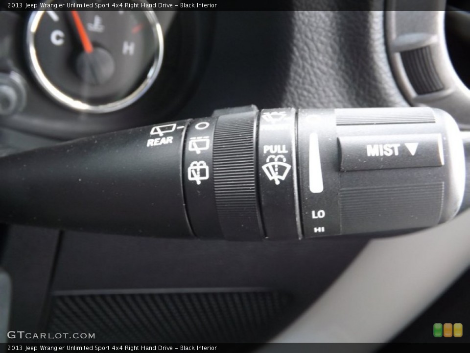 Black Interior Controls for the 2013 Jeep Wrangler Unlimited Sport 4x4 Right Hand Drive #76274363