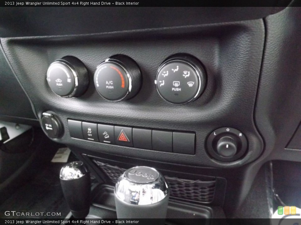Black Interior Controls for the 2013 Jeep Wrangler Unlimited Sport 4x4 Right Hand Drive #76274411