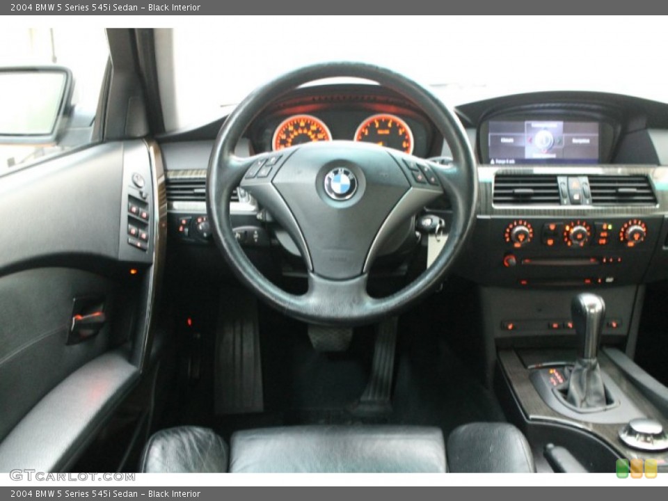Black Interior Dashboard for the 2004 BMW 5 Series 545i Sedan #76277648