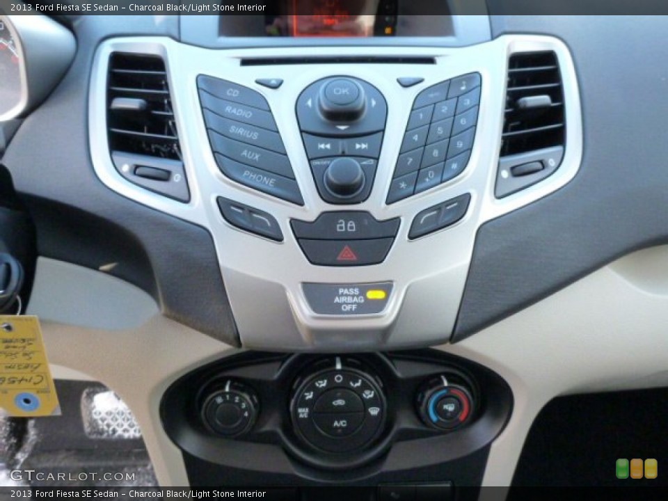 Charcoal Black/Light Stone Interior Controls for the 2013 Ford Fiesta SE Sedan #76285035