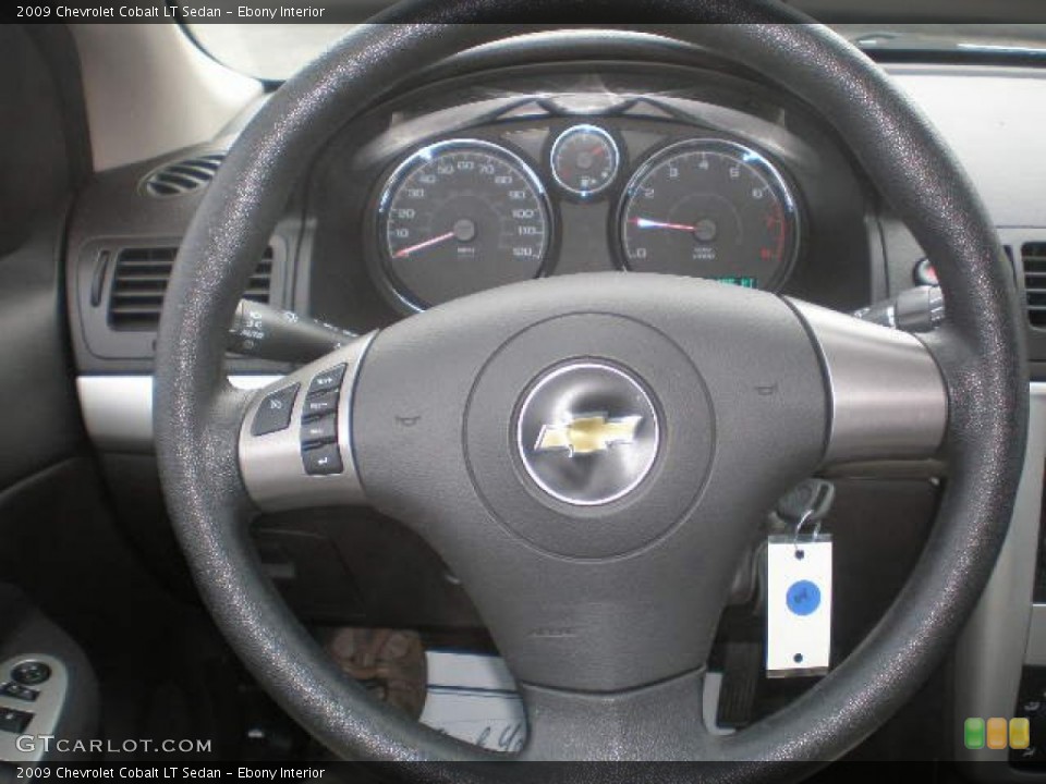 Ebony Interior Steering Wheel for the 2009 Chevrolet Cobalt LT Sedan #76285562