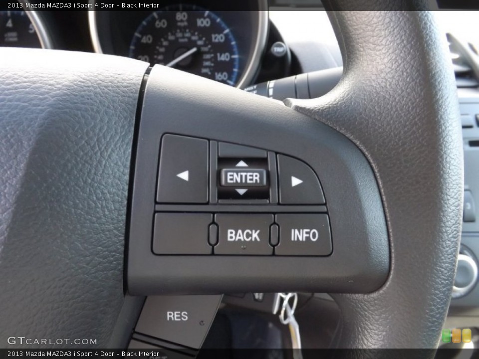 Black Interior Controls for the 2013 Mazda MAZDA3 i Sport 4 Door #76290933