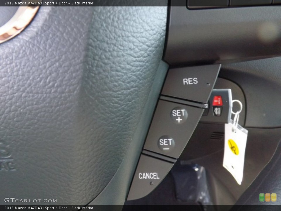 Black Interior Controls for the 2013 Mazda MAZDA3 i Sport 4 Door #76290947