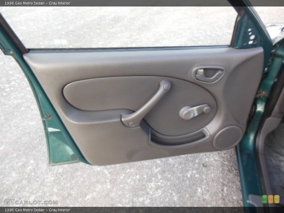 Gray Interior Door Panel for the 1996 Geo Metro Sedan #76292417