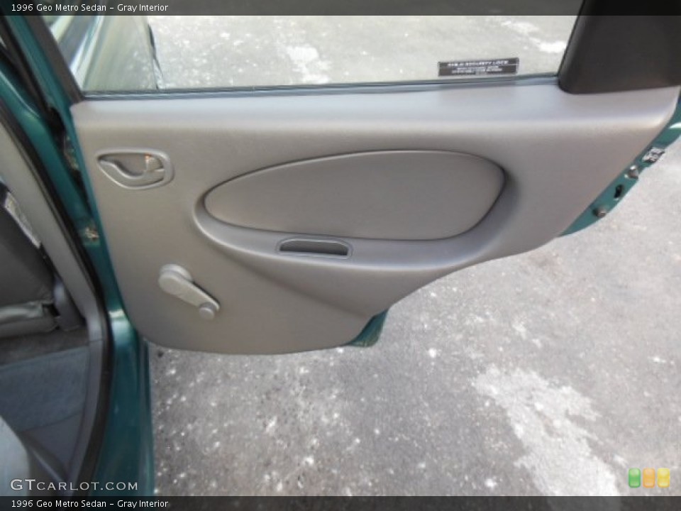 Gray Interior Door Panel for the 1996 Geo Metro Sedan #76292468