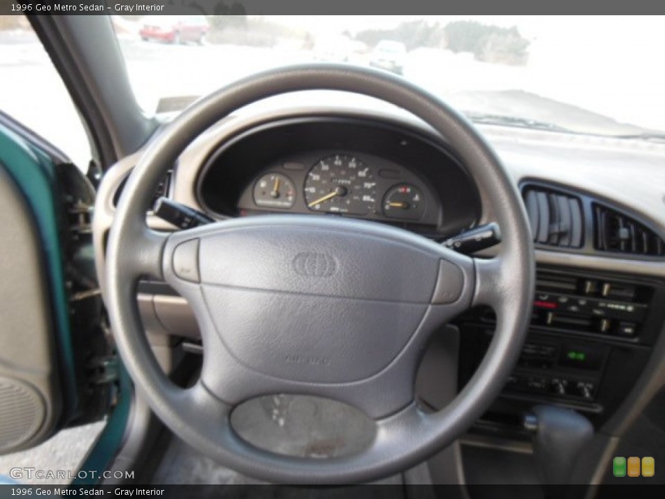 Gray Interior Steering Wheel for the 1996 Geo Metro Sedan #76292546