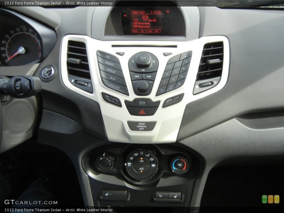 Arctic White Leather Interior Controls for the 2013 Ford Fiesta Titanium Sedan #76303402