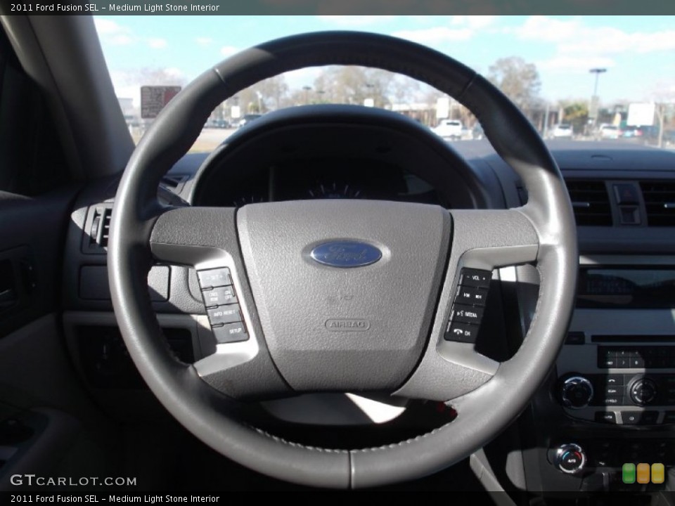 Medium Light Stone Interior Steering Wheel for the 2011 Ford Fusion SEL #76328348