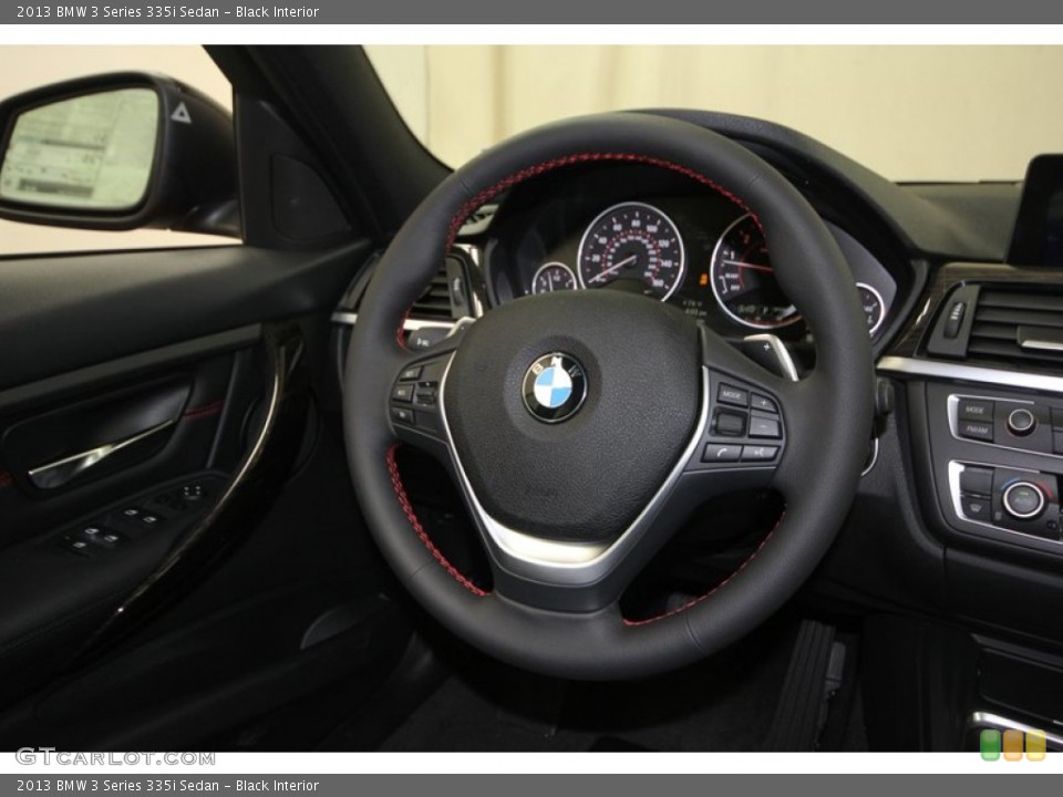 Black Interior Steering Wheel for the 2013 BMW 3 Series 335i Sedan #76334397