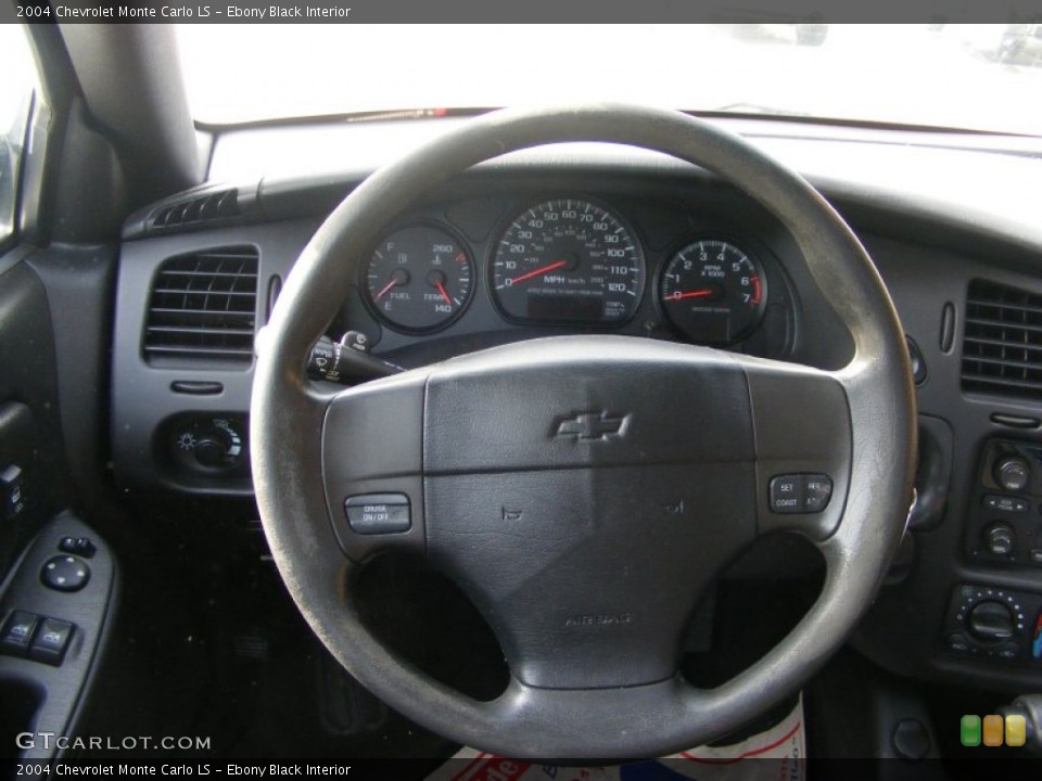 Ebony Black Interior Steering Wheel for the 2004 Chevrolet Monte Carlo LS #76336060