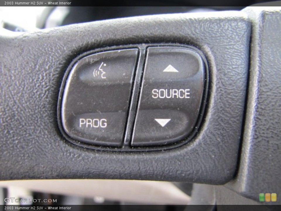 Wheat Interior Controls for the 2003 Hummer H2 SUV #76349335
