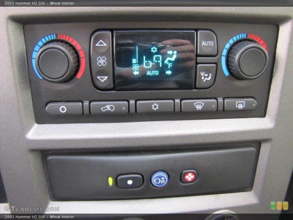 Wheat Interior Controls for the 2003 Hummer H2 SUV #76349458