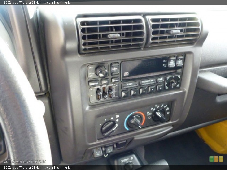 Agate Black Interior Controls for the 2002 Jeep Wrangler SE 4x4 #76349545