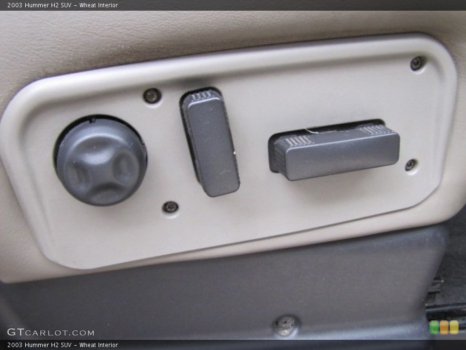 Wheat Interior Controls for the 2003 Hummer H2 SUV #76349606