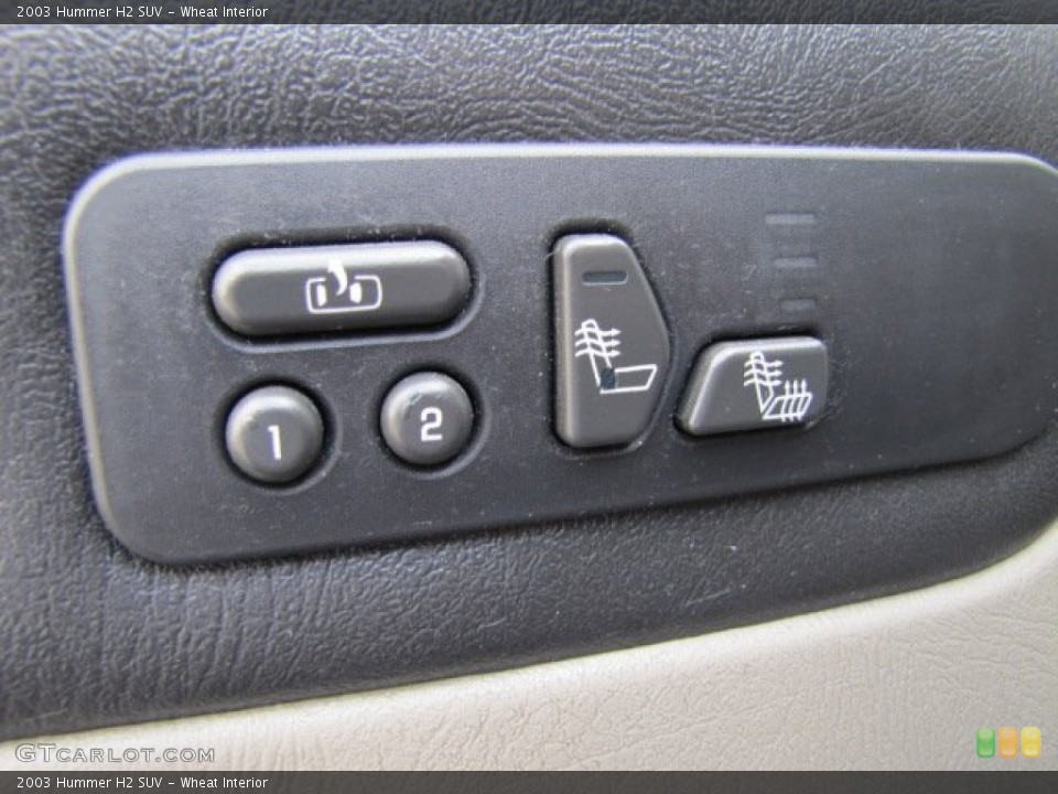 Wheat Interior Controls for the 2003 Hummer H2 SUV #76349889