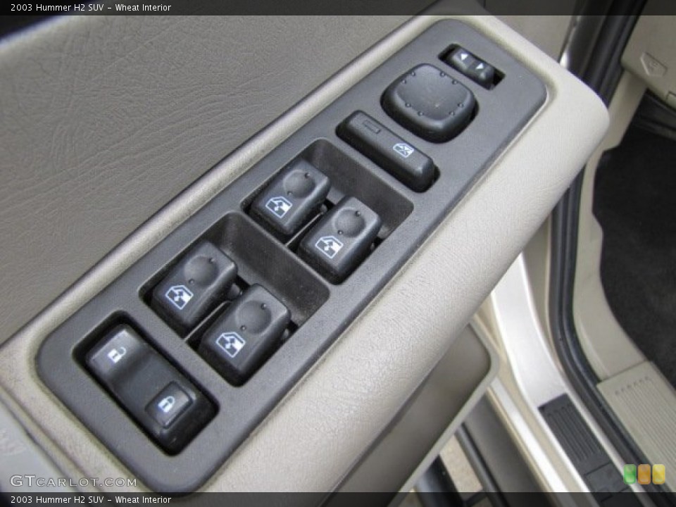 Wheat Interior Controls for the 2003 Hummer H2 SUV #76349911