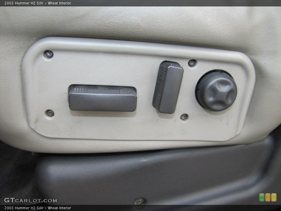 Wheat Interior Controls for the 2003 Hummer H2 SUV #76349926